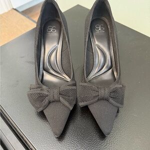 Elegant Black Bow Heels by [Brand]